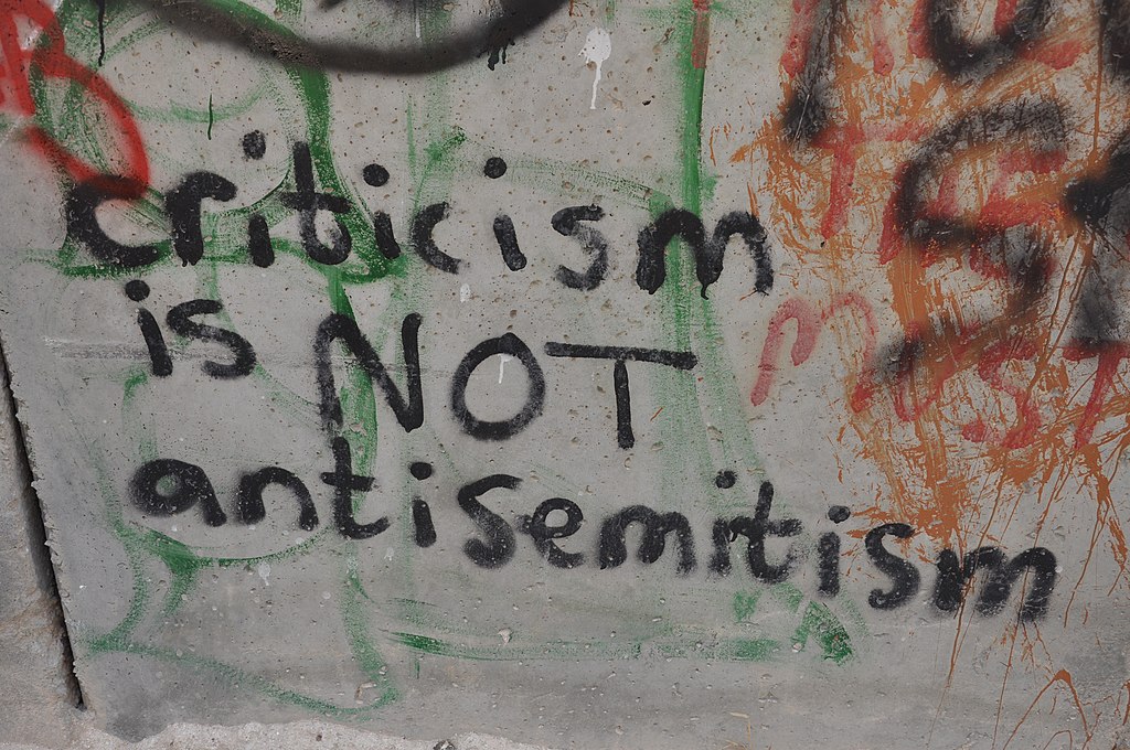 graffiti on wall: Criticism is NOT antsemitism