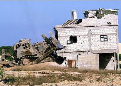 Photo of Israeli bulldozer and pockmarket House