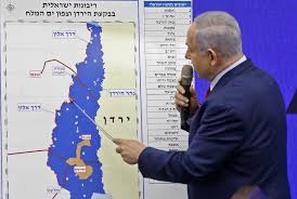 Israeli PM Netanyahu points to map of Palestine and Israel