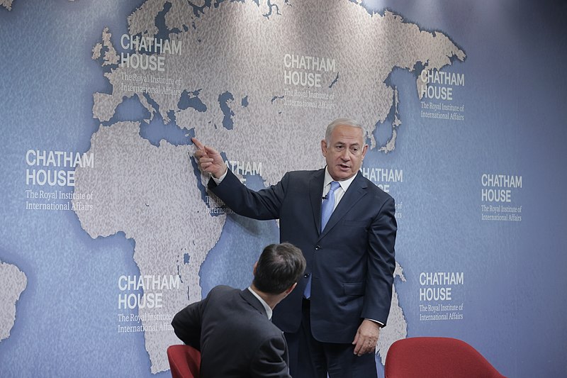 Israeli Prime Minister Netanyahu points to map of Middle East